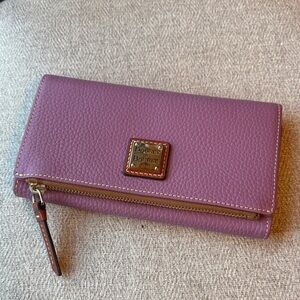 Dooney & Bourke Dark Mauve Pebbled Leather Continental Wallet with Exterior Zip